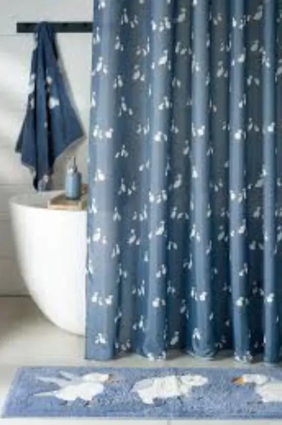 Premium shower curtains in luxury villa bathroom with marble finish